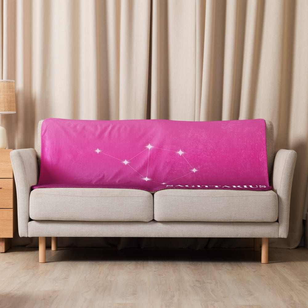 Sagittarius Zodiac Blanket in Lustrous Fuchsia in a lifestyle setting